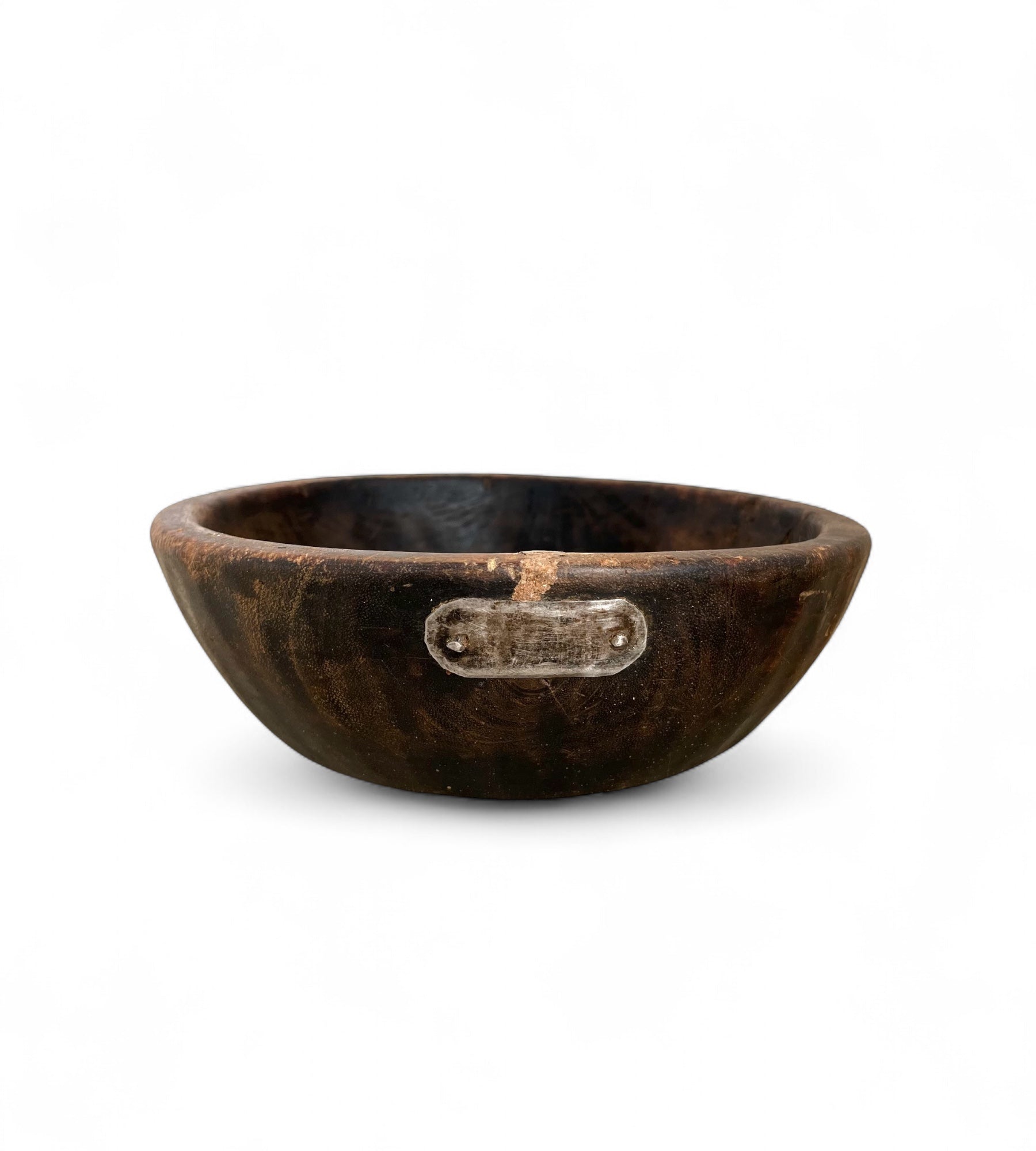 Wooden teak bowl with a metal handle on a white background