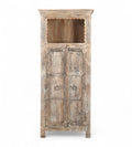 A vintage teak and recycled wood wardrobe with hand-carved details and a lime/multi-coloured patina. It features an upper open section with a scalloped wooden arch and two doors with a visible handle.