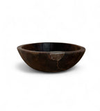 Wooden bowl on a white background