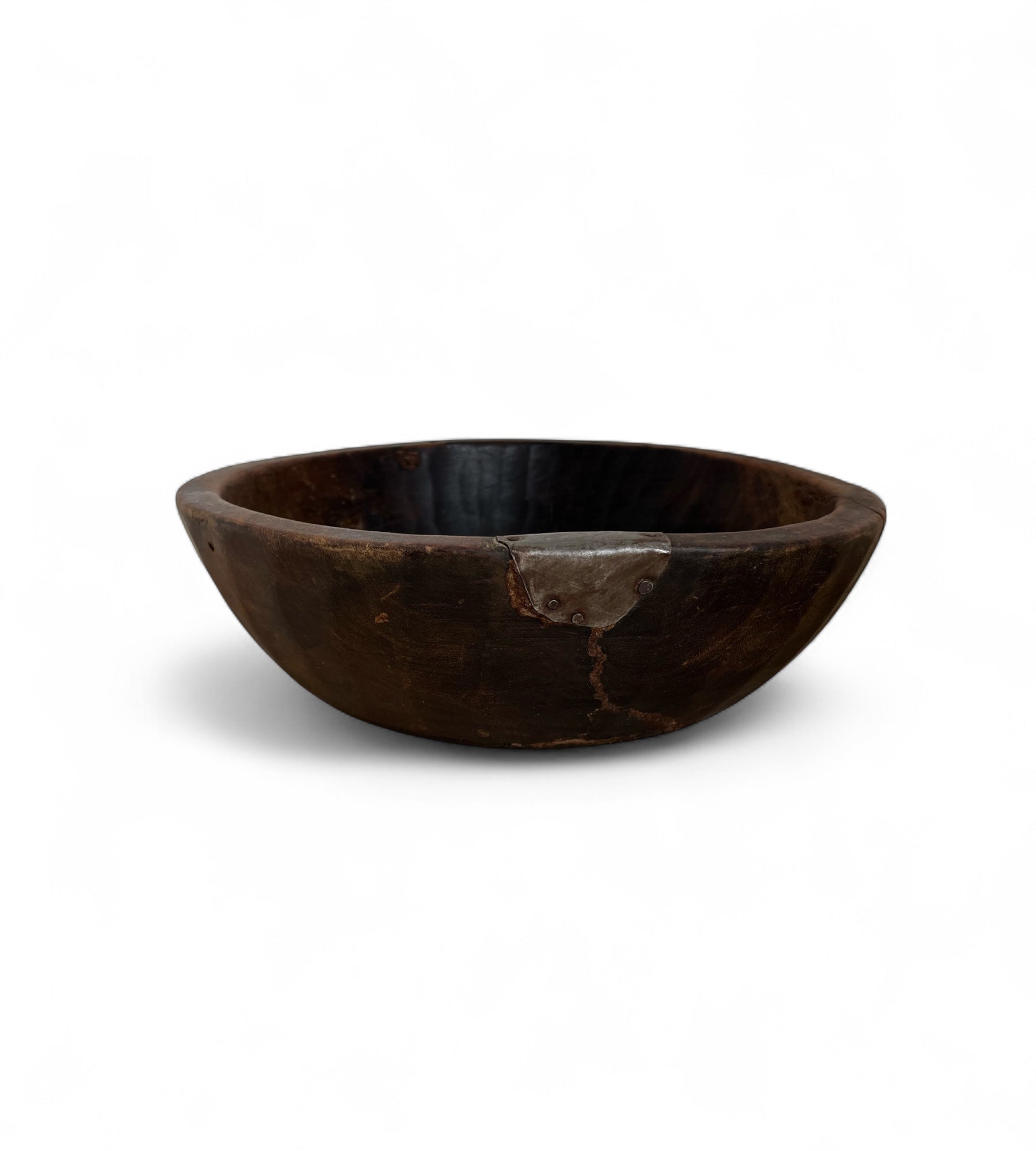 Wooden bowl on a white background
