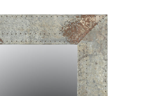 Detail of metal frame of a mirror.