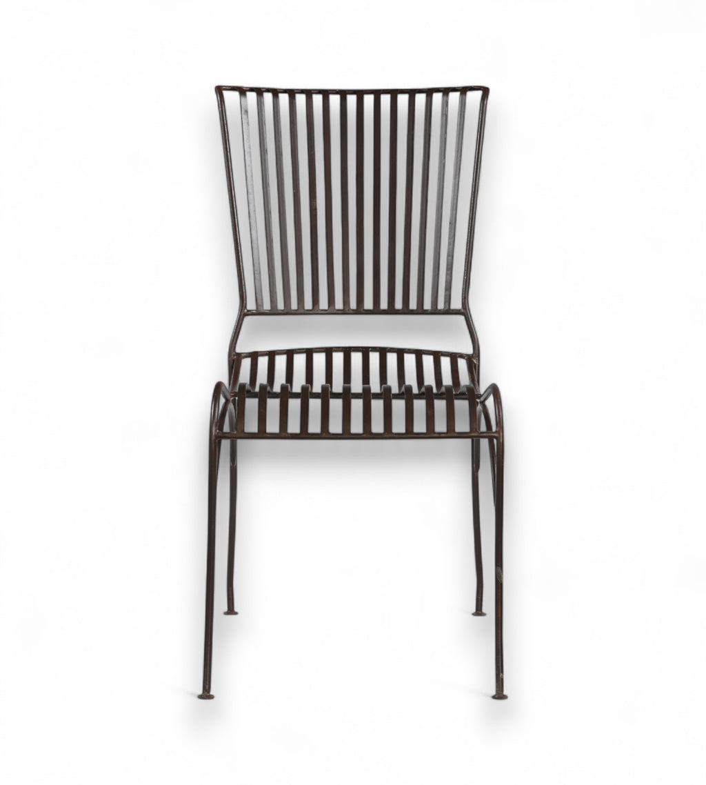 A dark finish iron chair with an open arched seat design and gently flared back, isolated on a white background.