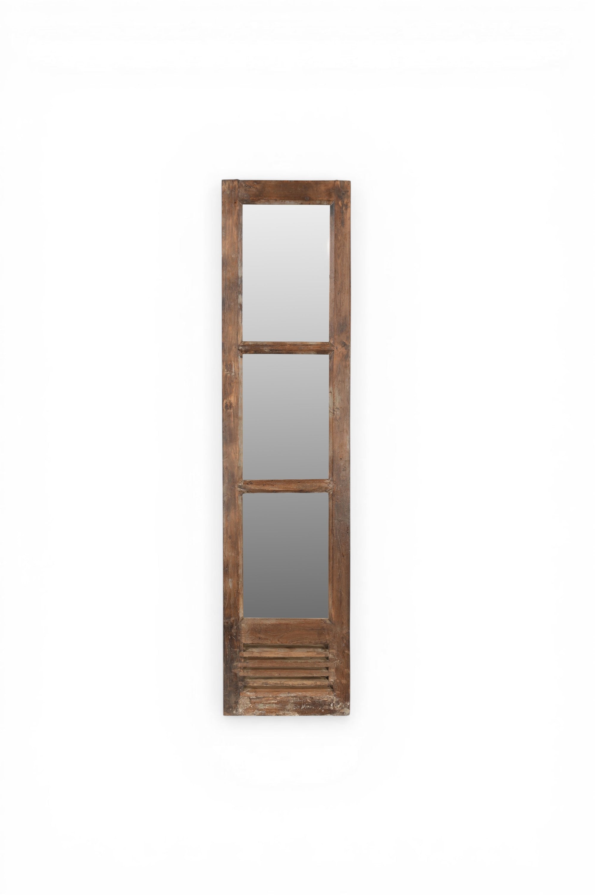 Reclaimed door turned into a mirror.