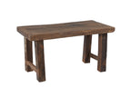 A vintage reclaimed wood bench with a rectangular seat and wooden legs.