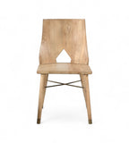 A vintage teak wood chair with a unique cut out detail in the backrest and brass capped legs.