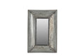 A rectangular wall mirror with a galvanised metal frame featuring visible rivets and a weathered finish.