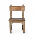 A wooden chair with a patina finish, featuring hints of green and yellow paint, with a simple backrest and seat design.