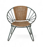 A vintage chair with a radial iron frame and natural rope seat and backrest, primarily in green and brown colors.