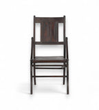 A vintage teak wood chair with a deep rich dark brown finish, featuring a gently curved backrest and seat.