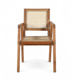 A vintage teak wood armchair with hand woven rattan seat and backrest, featuring angular legs and a clean design.