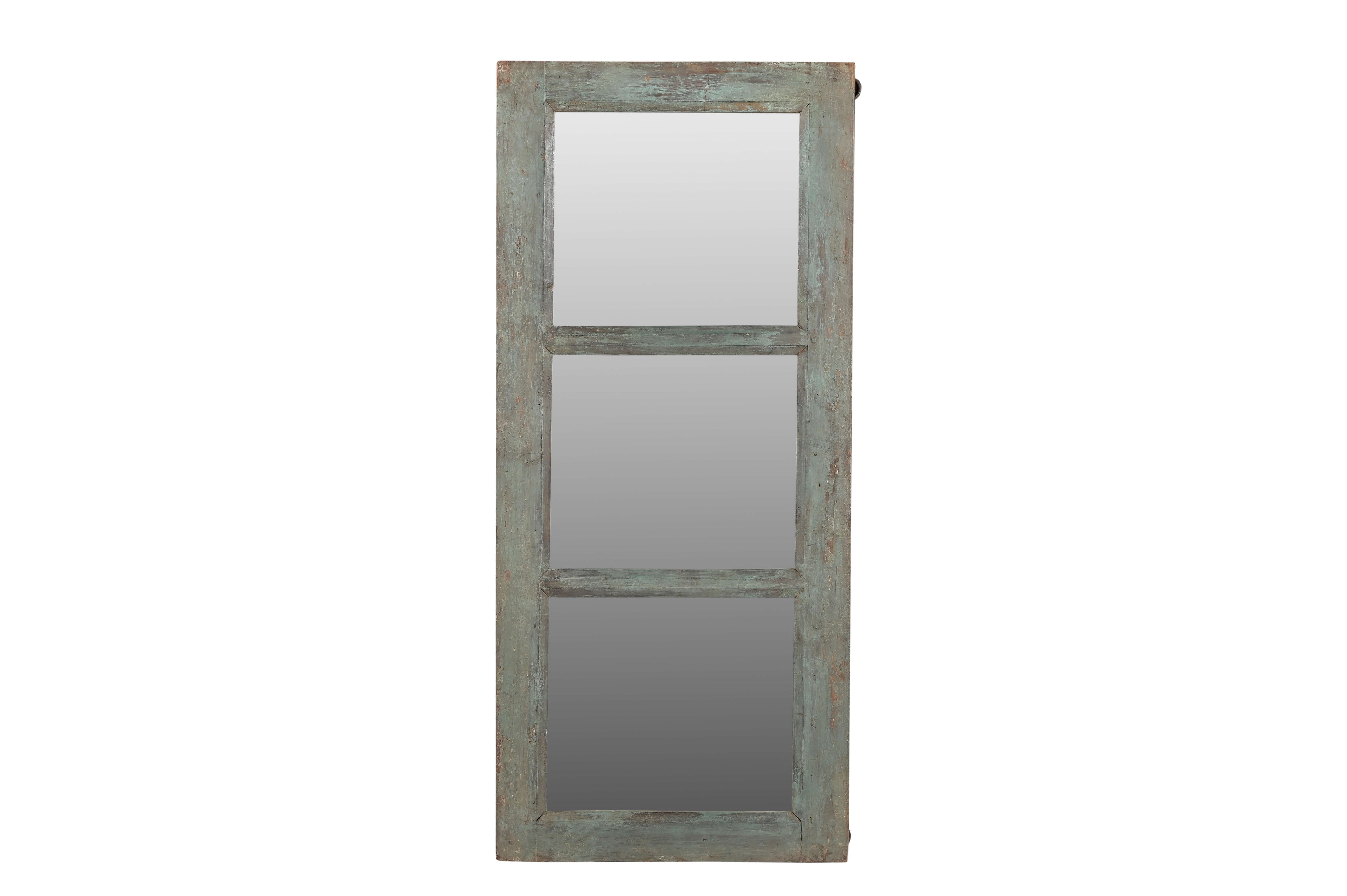 Wooden-framed mirror with a rustic finish on a white background