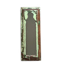 Vintage-style mirror with a weathered green and brown frame on a white background